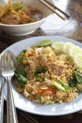 thai fried rice and vegetable on wood table
