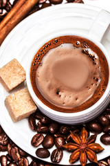 Coffee cup with coffee beans and biscotti isolated on white back