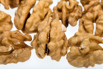 cracked walnut isolated on the white background