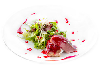 Duck breast with berry sauce and salad