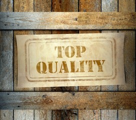 Stamp Top Quality label old wooden box