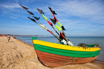 Fototapeta premium Old fishing boat at the beach in Sopot Poland.