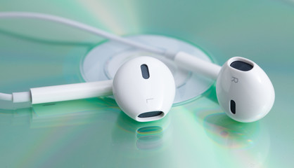 White earphone on music dvd