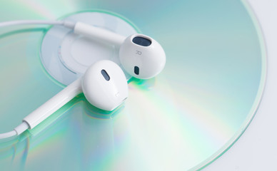 White earphone on music dvd