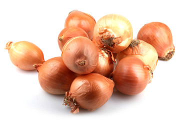 Fresh onion bulbs isolated on white background