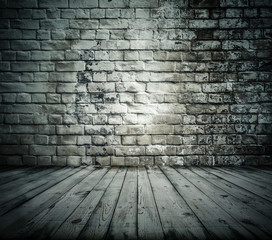 old room with brick wall