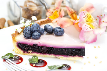 piece of blueberry pie on a table in a restaurant