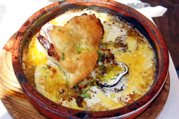 Traditional Spanish soup with fish and oysters