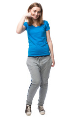 Young woman making a - call me - gesture