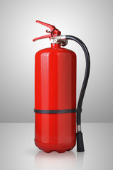 fire extinguisher on gray background