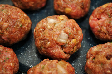 Raw Meatballs in a Baking Pan Ready for the Oven