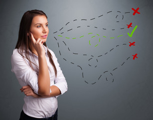 Young woman choosing between right and wrong signs