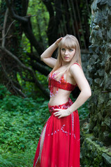 Young beautiful girl on a walk in the country