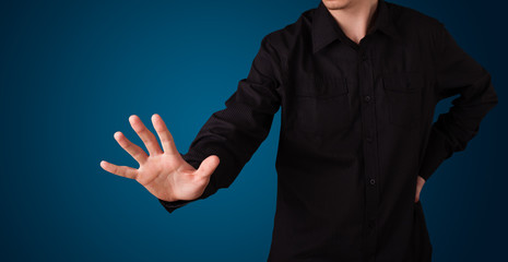 Businessman pressing imaginary button