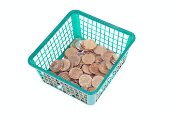 Small israeli coins in green basket