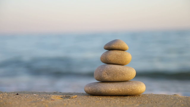 Stacked Zen stones on the beach