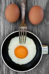 fried and raw egg background