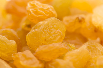 background of yellow raisins. macro