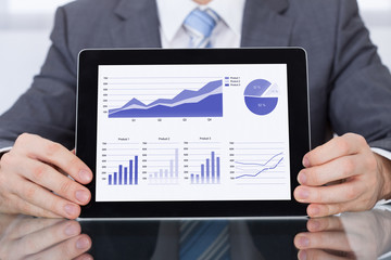 Businessperson Showing Graph