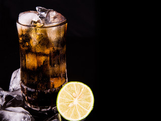 Cola Drinks With Ice Cube and Lime
