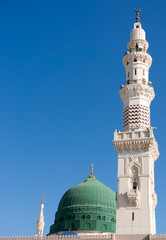 Towers of the Nabawi mosque againts blue sky © AHMADZAIHAN