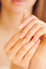 Care for beautiful woman hands. Focus on hands