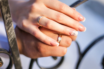 Newlywed's Hands with Rings