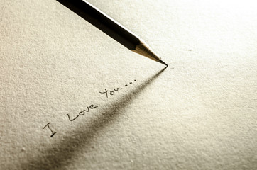 Fototapeta premium Pencil with paper writing I love you
