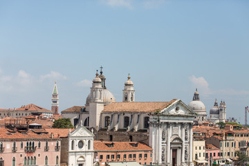 Fototapeta na wymiar Church Facade with Bell Towers in Venice