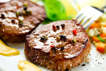 Grilled steaks and vegetables