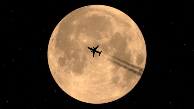 Flying Airplane On Background Of The Moon.