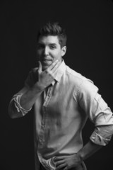 portrait of sexy man model doing a fashion shoot in the studio -