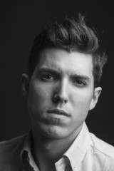 Obraz premium portrait of sexy man model doing a fashion shoot in the studio -