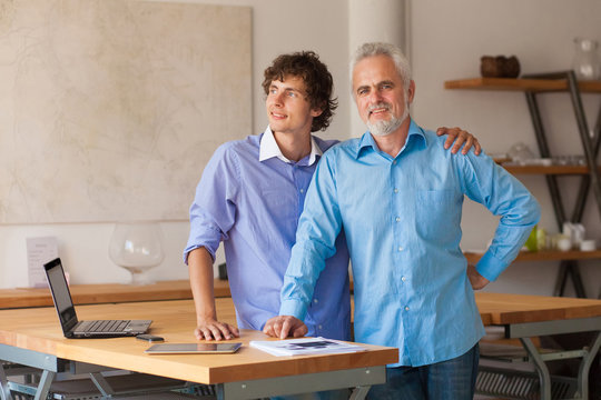 business man working on laptop with Colleges indoor