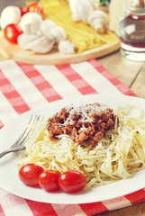 Pasta bolognese on the wooden table