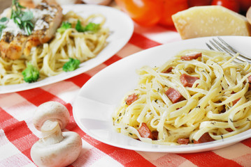 Pasta carbonara on the wooden table