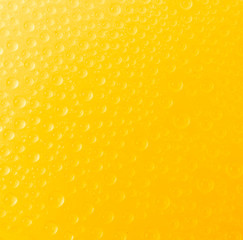 Water drop on color background