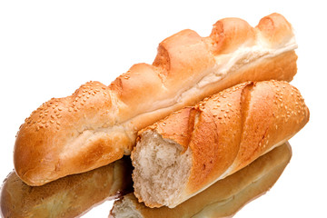 Two slices of white bread with sesame