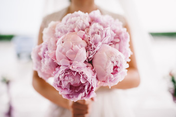 Bride holding the wedding bouquet