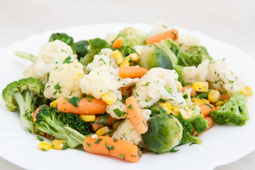 cooked vegetables in white plate