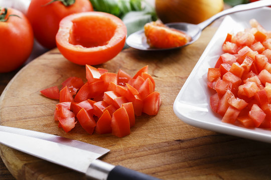 Sliced ​​tomato Cubes On The Board