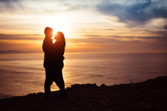 Couple in love at sunset