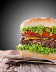 delicious hamburger on wood