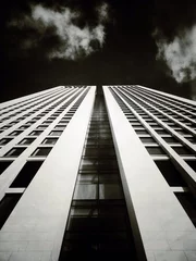 Foto op Canvas Corporate building tower. Low angle view.  © Nektarstock