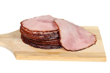 sliced ham on cutting board