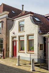 Fototapeta na wymiar Traditional Dutch house in a small village