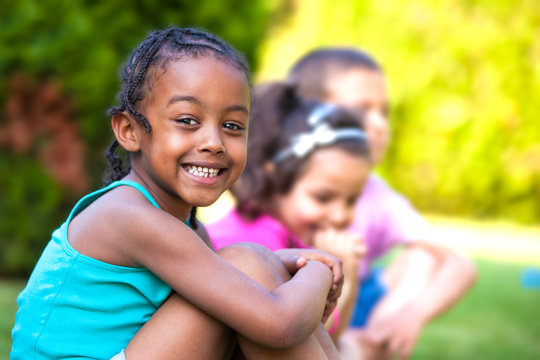 Outdoor portrait of a Adorable little African American girl