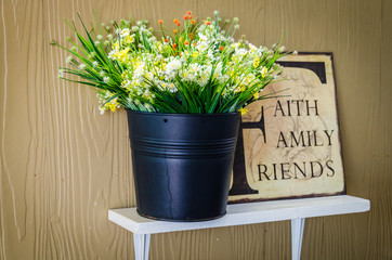 Interior plastic flower in vase