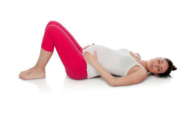 Fototapeta na wymiar Pretty pregnant woman resting in her training