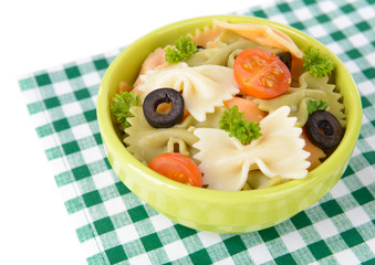 Delicious pasta with tomatoes on plate on table close-up